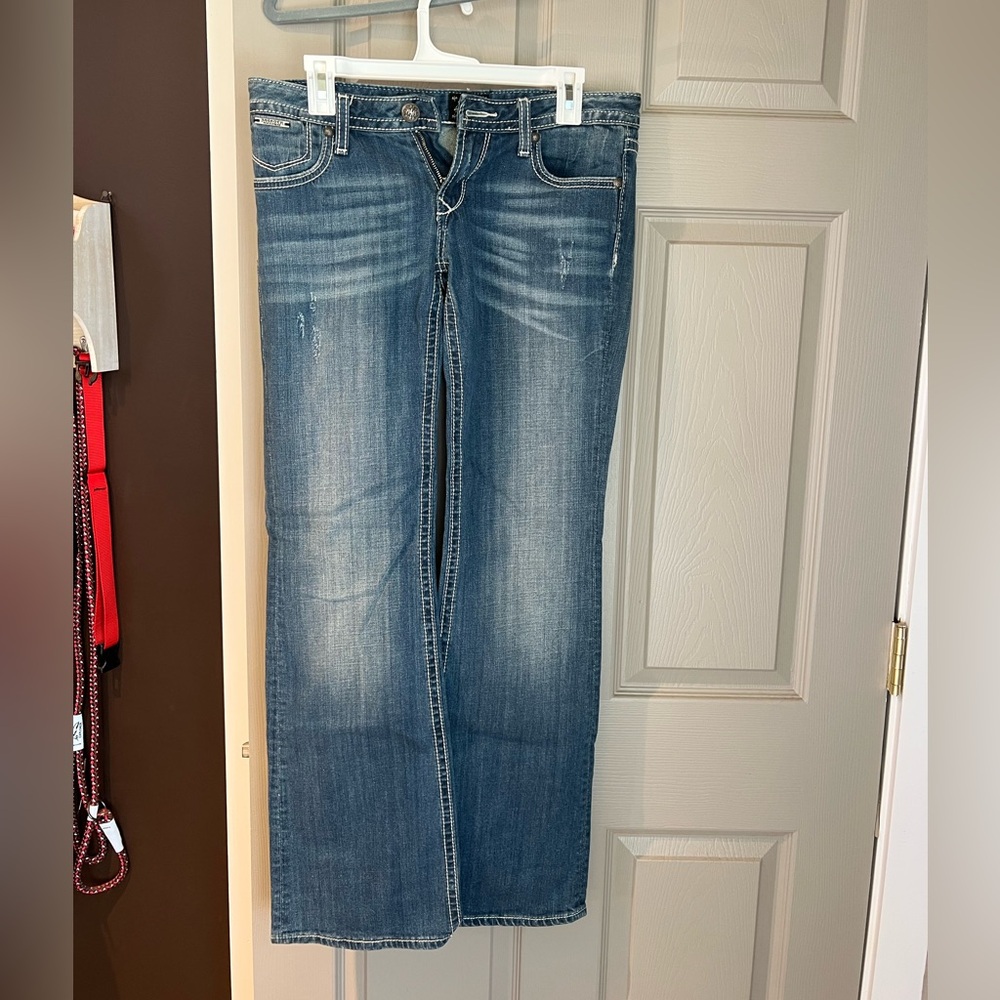 Rerock for express boot cut jeans. Size 6 regular. Back pocket detail.